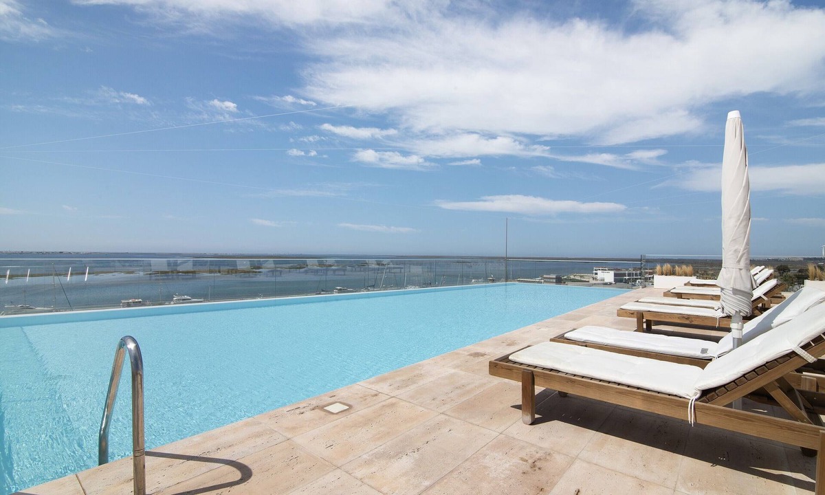 Olhao Apartment | Apartment "Mare Nostrum" with Sea View, Shared Pool and Wi-Fi