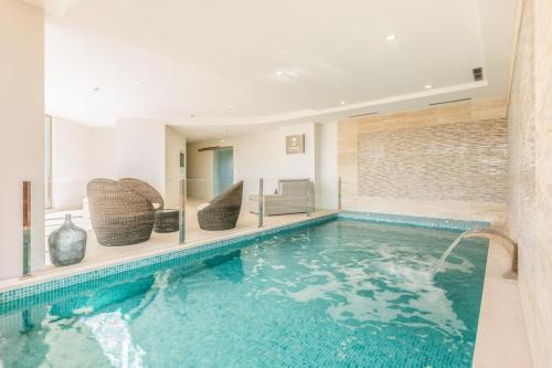 Lagoa Hotel | Caneiros Luxury House & Suites