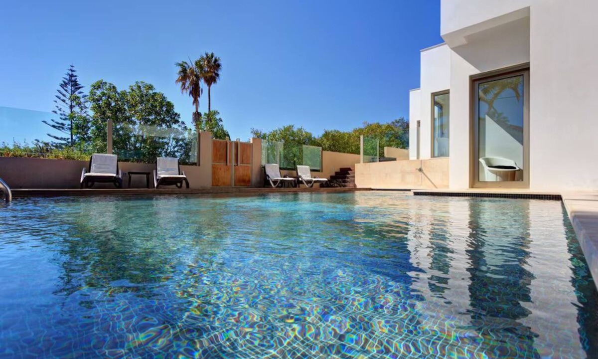 Praia da Luz Villa | Modern beachfront villa with heated pool and jacuzzi, ideal for families