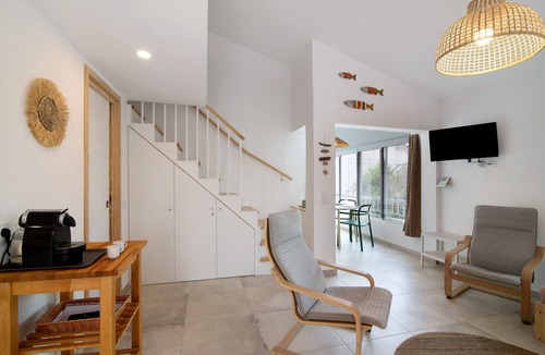 Santa Luzia Apartment | Apartment 'Cosy Beach Loft Pedras Del Rei' with Shared Pool, Wi-Fi and Air Conditioning