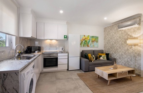 Santa Eulalia Apartment | Apartment 'Stunning Modern In Oura' with Shared Pool, Wi-Fi and Air Conditioning