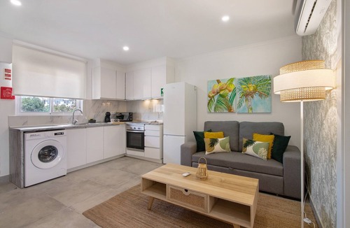 Santa Eulalia Apartment | Apartment 'Stunning Modern In Oura' with Shared Pool, Wi-Fi and Air Conditioning