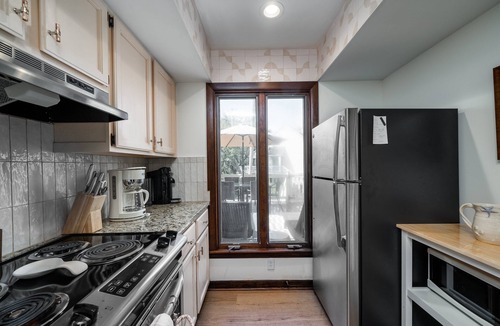 Spinnaker Beachhouses Villa | Beautiful 2BR/2BA Villa! Walk to Beach & Club! Amenity Cards! Dog Friendly!