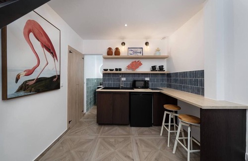 Portimao City Centre Apartment | Charming historic tiny house in Portimão's vibrant old town, steps from the marina and promenade. Easy access to Algarve beaches. Sleeps 4. Pets welcome. Self check-in via lockbox.