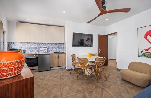 Alvor House | Enjoy exclusive use of two beautifully refurbished townhouses combined into one spacious 4-bedroom home in Alvor Old Town. Steps from the harbour, beach and restaurants, with sunny sea-view terraces jacuzzi, 2living rooms, 2kitchens, AC throughout.