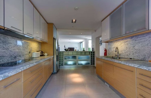 Praia da Luz Villa | Modern beachfront villa with heated pool and jacuzzi, ideal for families