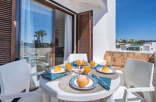 Alpouvar Apartment | Sunny Flat with a Balcony & Pool by HostWise