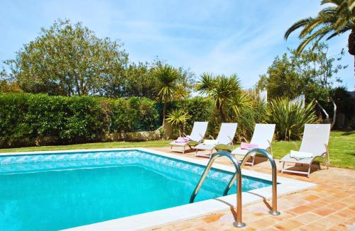 Montechoro Villa | Villa Bogota - Moradia acolhedora com piscina aquecível e BBQ