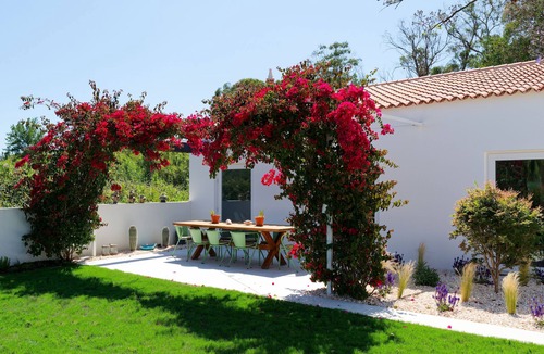 Quarteira Villa | Where the lagoon meets the ocean - a tranquil architectural sanctuary