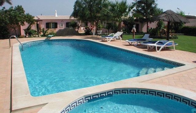 Apartment on a beautiful plot with pool near the sea