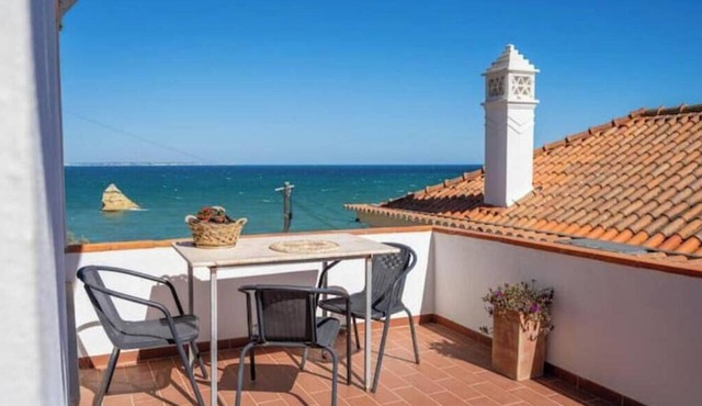 Charming apartment with a terrace right on the beach