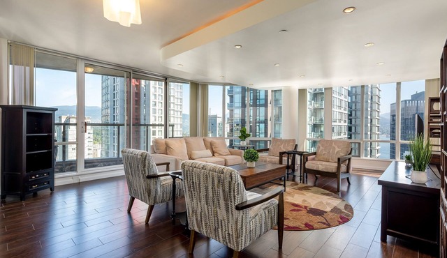 Elevated Coal Harbour living with panoramic harbour & mountain views, steps to Vancouver's iconic waterfront, dining and shopping. in Vancouver