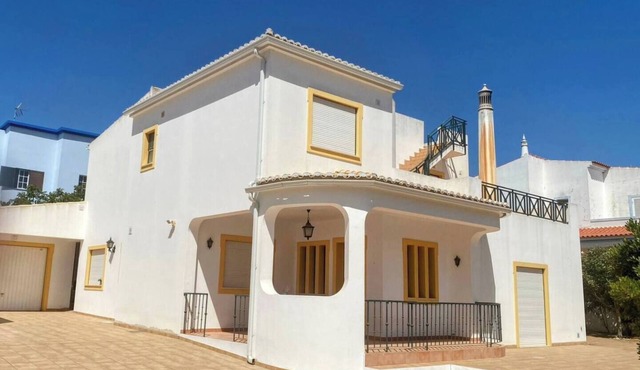 Exclusive 4 bedroom+ 3 bath Quelfes villa with panoramic ocean & mountain views.