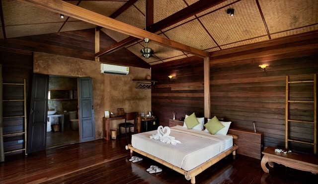 Luxury loft in stilted wooden longhouse in Tambon Nang Lae