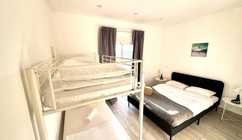 Quadruple Room with Shared Bathroom
