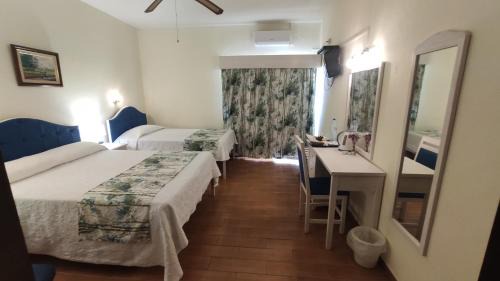 Triple Room with Balcony and Sea or River View 